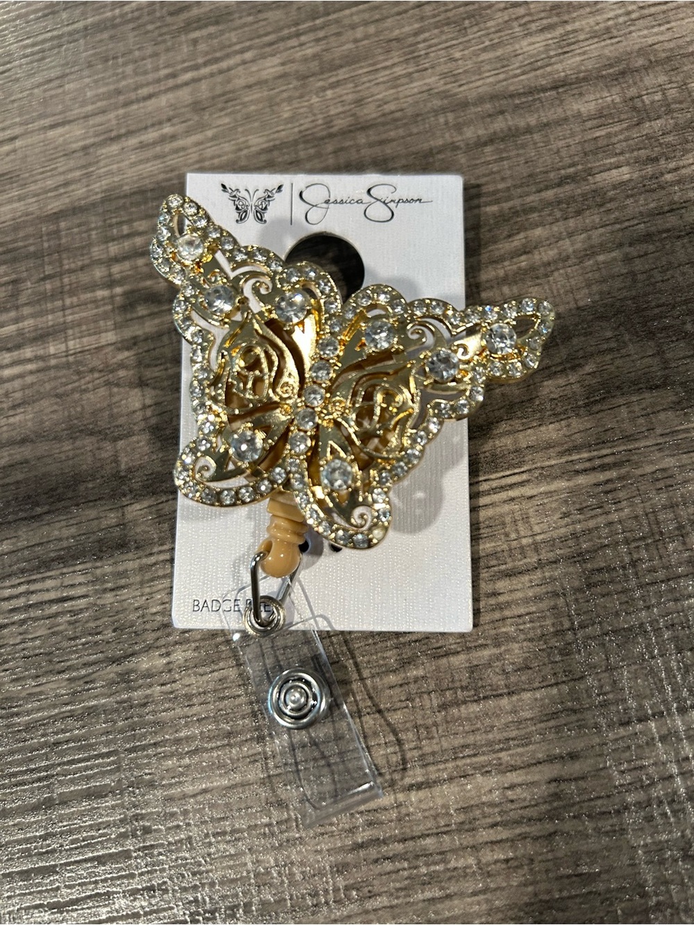 Jessica Simpson Gold and Clear Crystal Butterfly Badge Reel